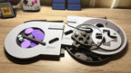 Angled view of clickable SNES controller wall art showing dimensional details