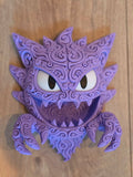3D printed Haunter Pokémon wall art with purple filigree-style details