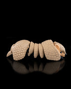 Armadillo articulated 3D printed toy by 3DPRINTSWA with detailed scaly armor and flexible segments shown in a curled pose from the Articulated Animals collection