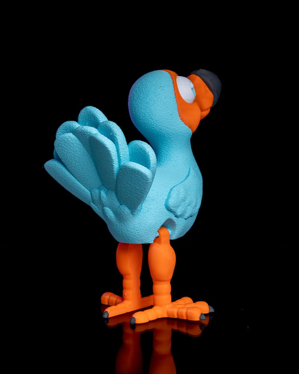 Articulated Dodo 3D printed articulated bird toy in blue and orange by 3DPRINTSWA from the Articulated Animals Featured collection