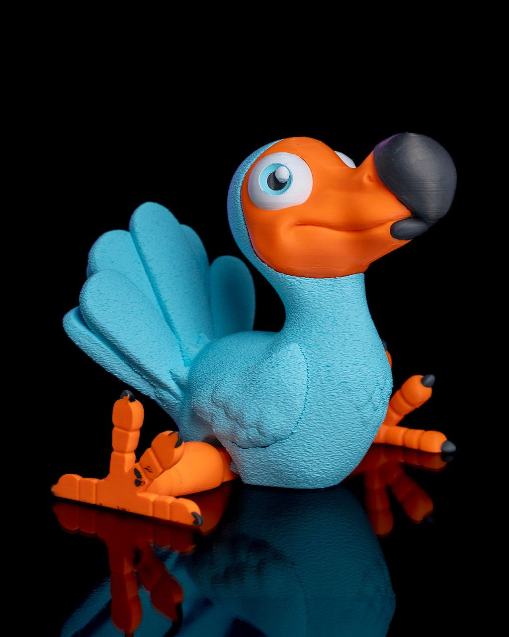 Articulated Dodo colorful articulated 3D printed toy bird with bright blue body orange beak and flexible limbs by 3DPRINTSWA from Articulated Animals Featured