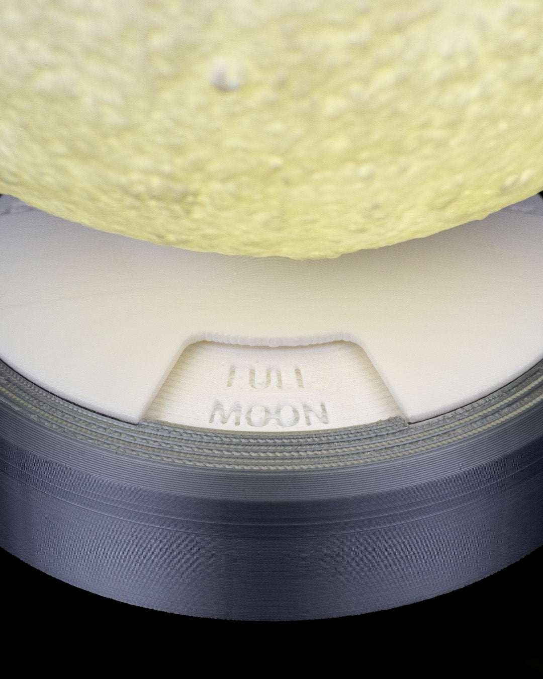 Bright Phases – Table Lamp by 3DPRINTSWA showing an illuminated textured moon above a 3D printed base for home decor in Lamps/Lights