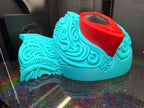 Side view of 3D printed Squirtle Pokémon wall art with dimensional details