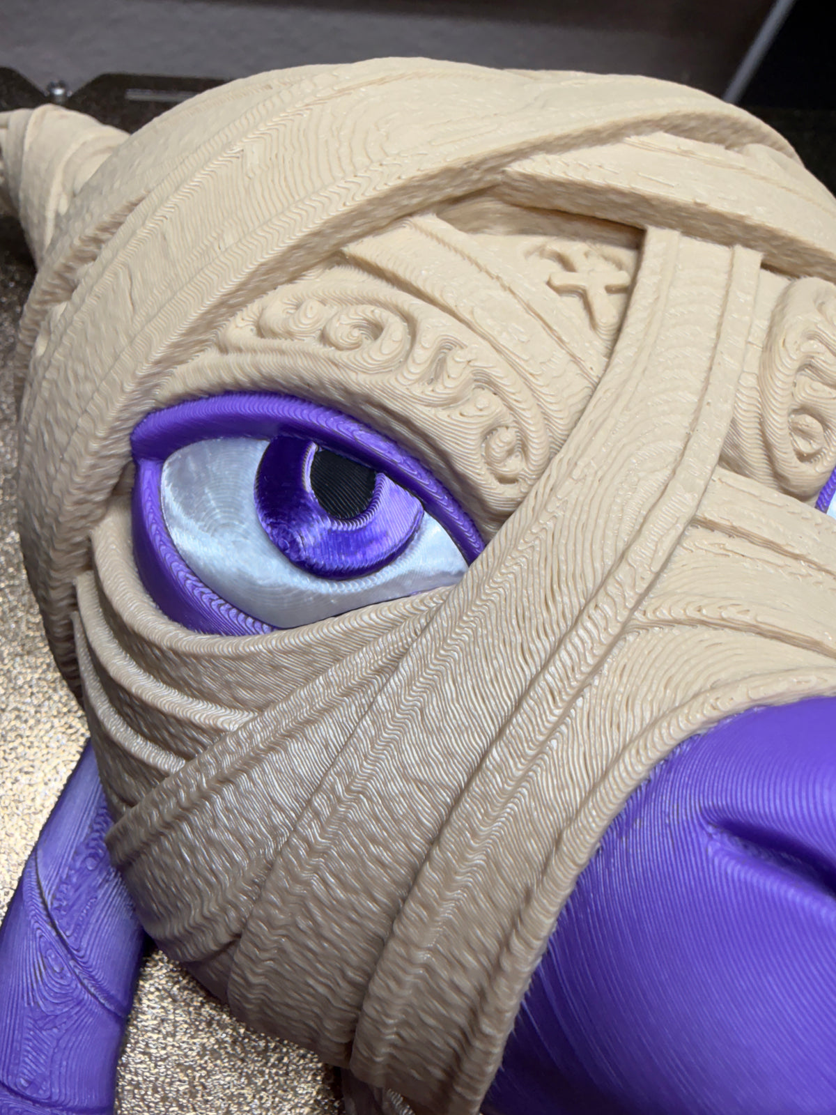 Angled view of 3D printed Mummy Mewtwo Pokémon wall decor