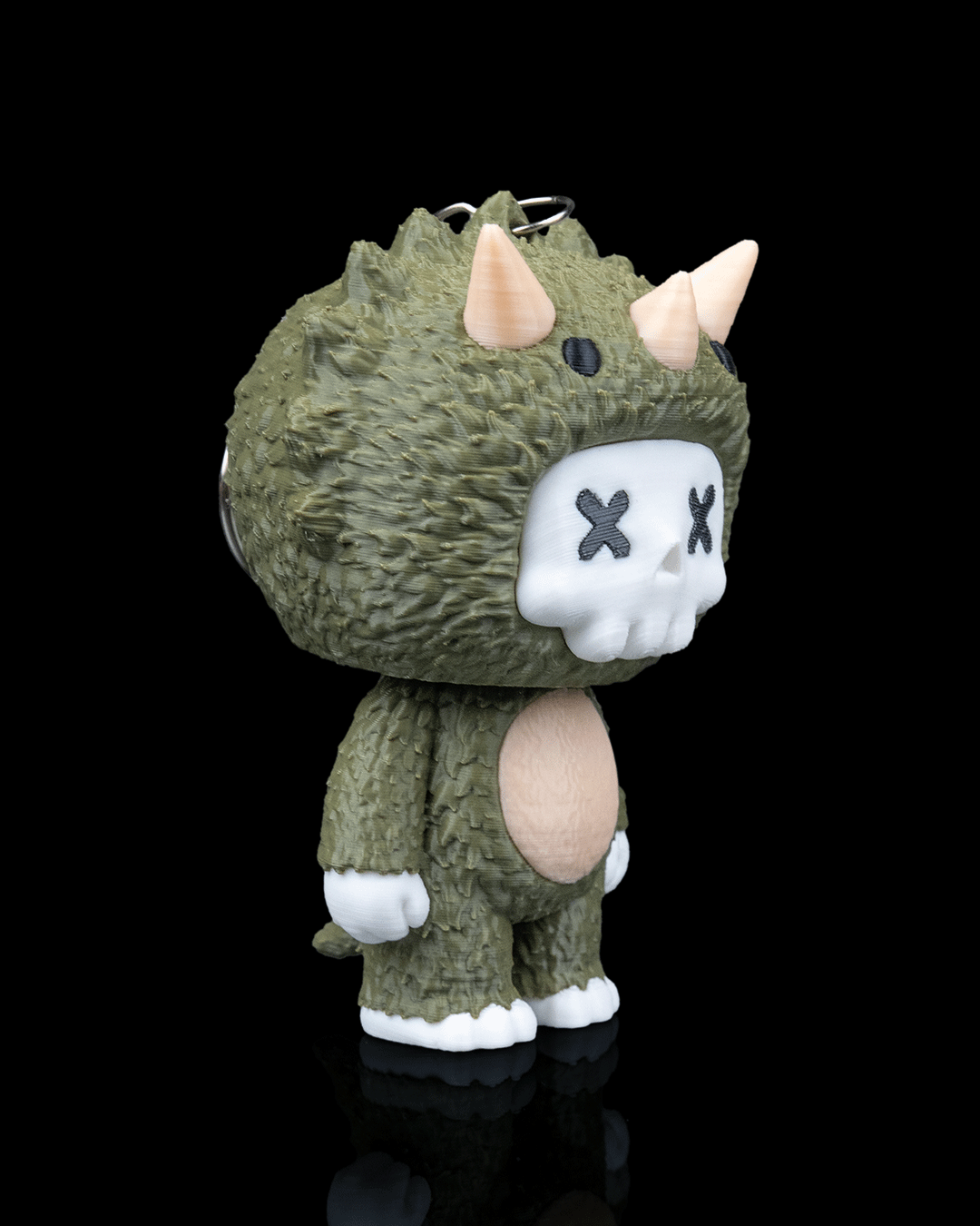 Trixi spooky skeleton triceratops keychain with textured green dinosaur costume three horns white skull face and matching charm by 3DPRINTSWA from Keychains Animals