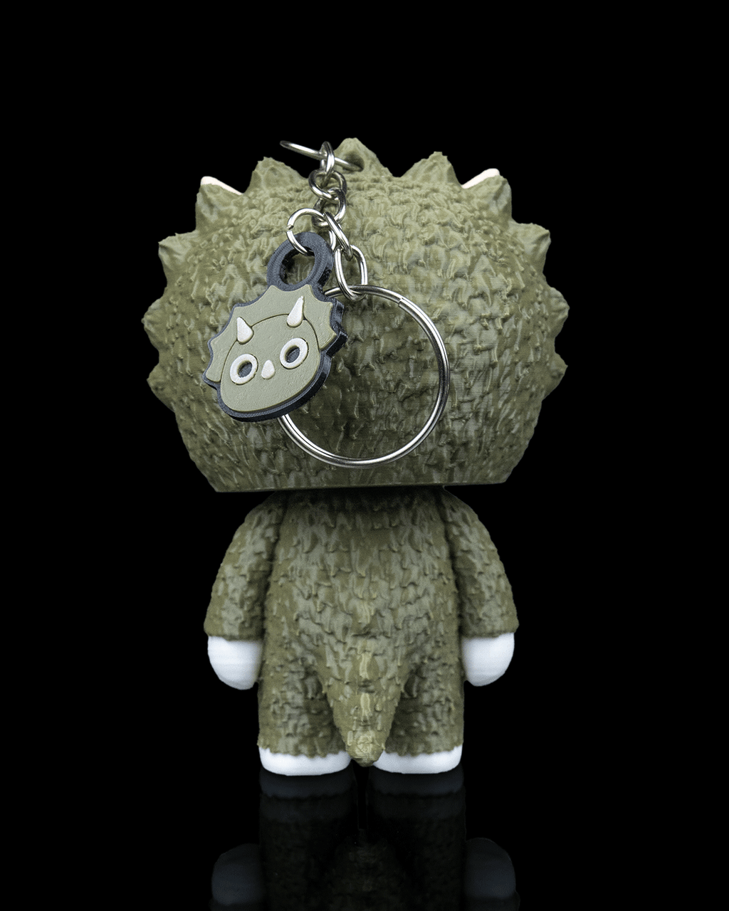 Trixi skeleton triceratops keychain with textured green dinosaur costume and matching face charm by 3DPRINTSWA from Keychains and Animals collection