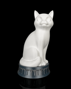 X-Ray Cat lamp with the light off, showing a white cat on a dark arch-patterned base