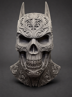 Upright front view of the Batman-inspired skull decor with pointed ears and ornate scrollwork against a dark background.