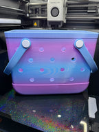 Front view of the assembled blue and purple TPU tote with blue handles and white attachment buttons.