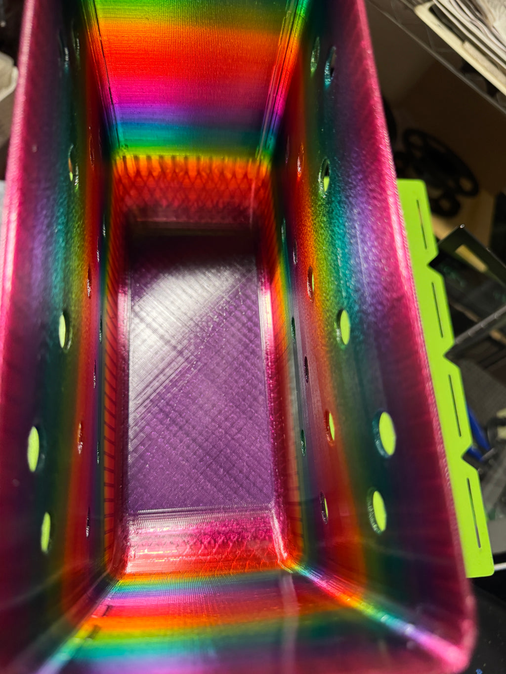 Top view into the rainbow tote body showing its rectangular compartment and printed base.