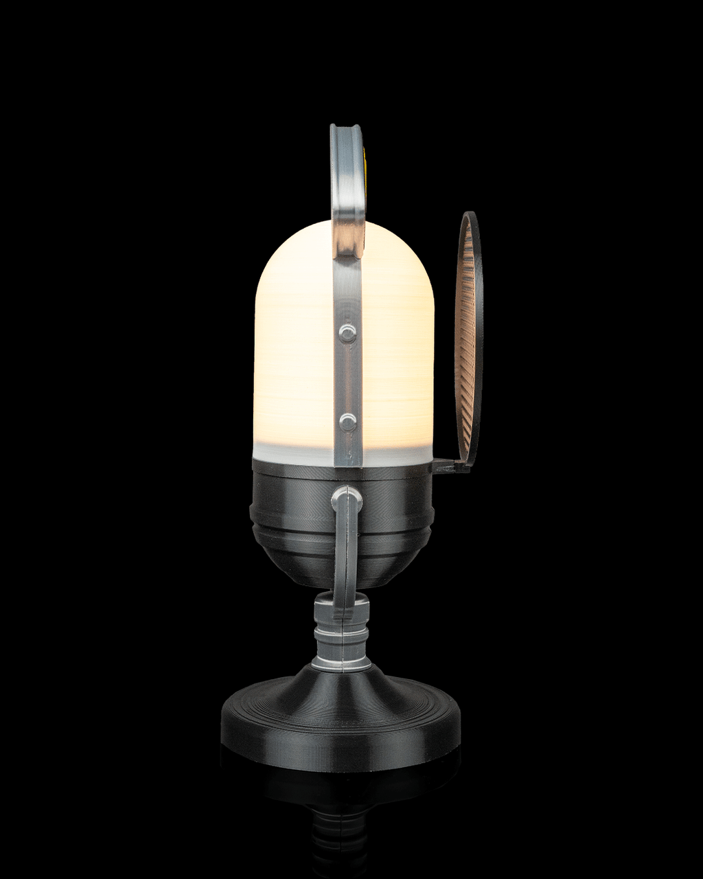 Broadcast microphone lamp illuminated, side view