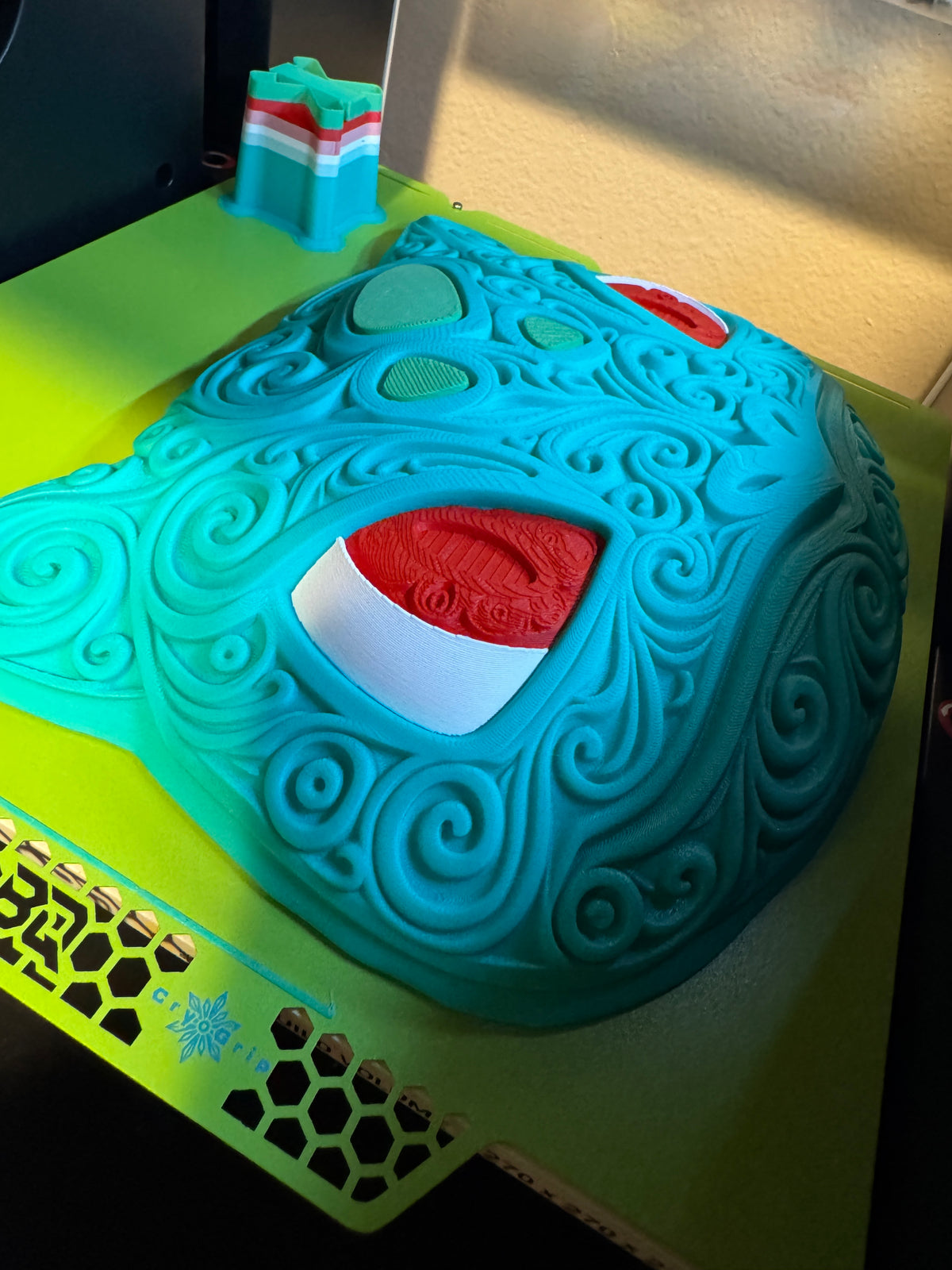 Angled close-up of Bulbasaur wall art showing the depth of its sculpted cheek, eye, and raised swirls.