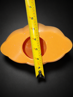 Open Ditto lantern with a tape measure across its top opening and body for size reference.