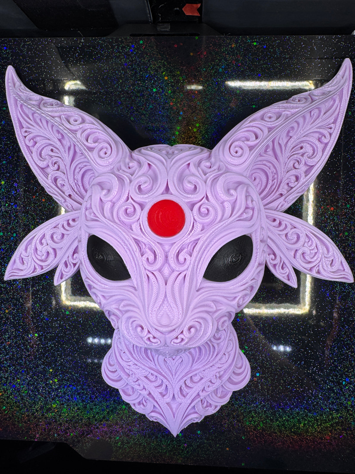 Full front view of pale lavender Espeon wall art with ornate scrollwork, black eyes, and a red forehead gem.
