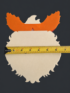 Back of Flareon wall art with a tape measure across its cream-colored fur to show width.