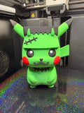 Front view of green Frankenstein Pikachu figure with black hair and stitches, red cheeks, and neck bolts.