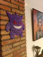 Purple Gengar wall art displayed on a brick wall.