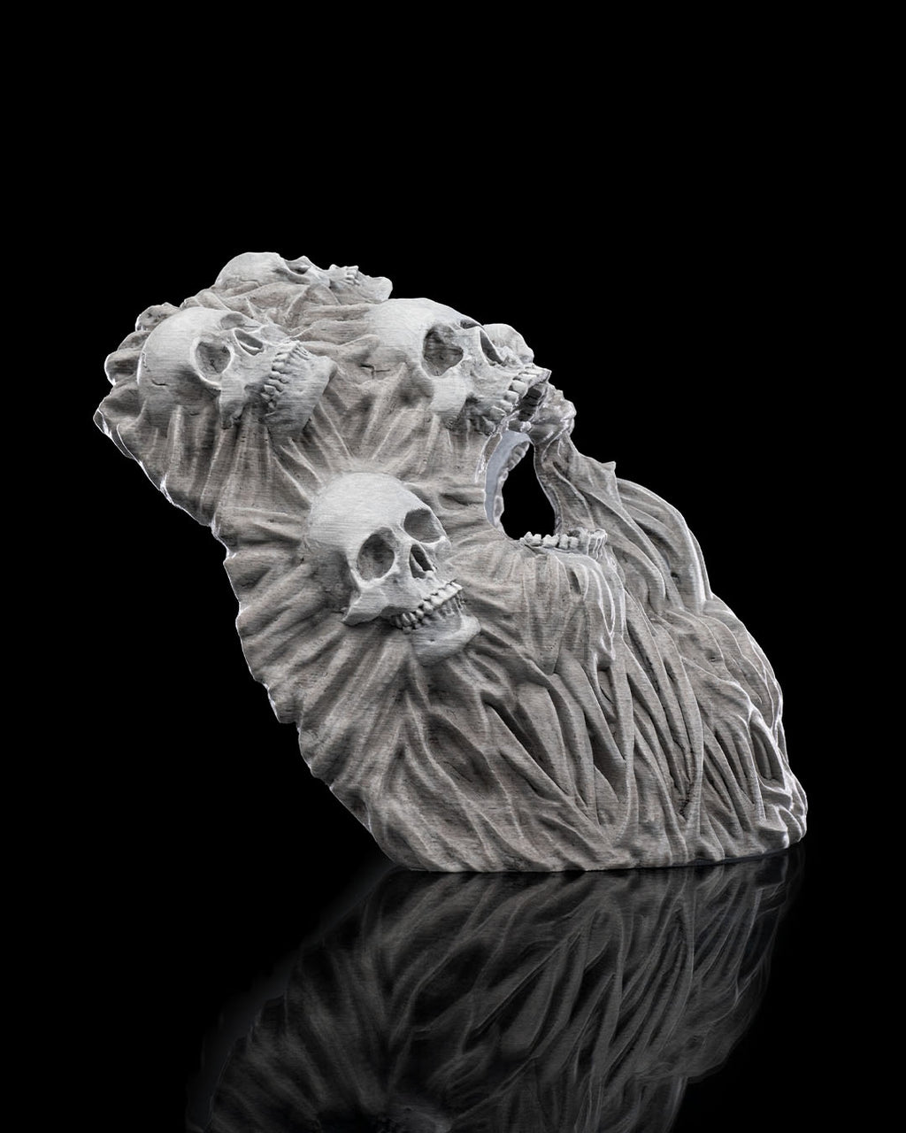 Side angle of gray Ghoul Face mask showing its curved profile and layered skull and root texture.