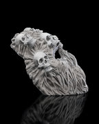 Side angle of gray Ghoul Face mask showing its curved profile and layered skull and root texture.