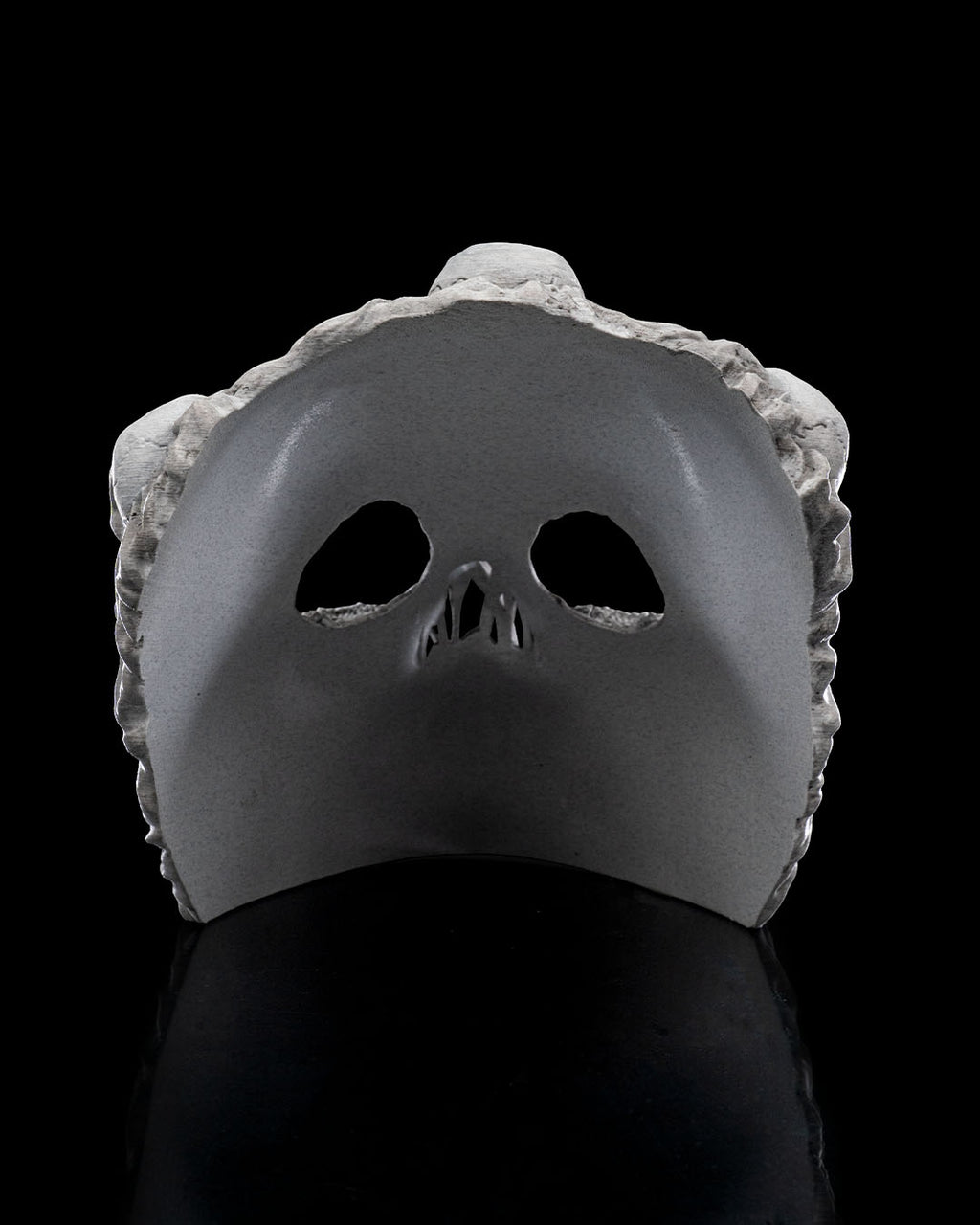 Interior of the Ghoul Face mask showing the curved face opening and eye and nose cutouts.