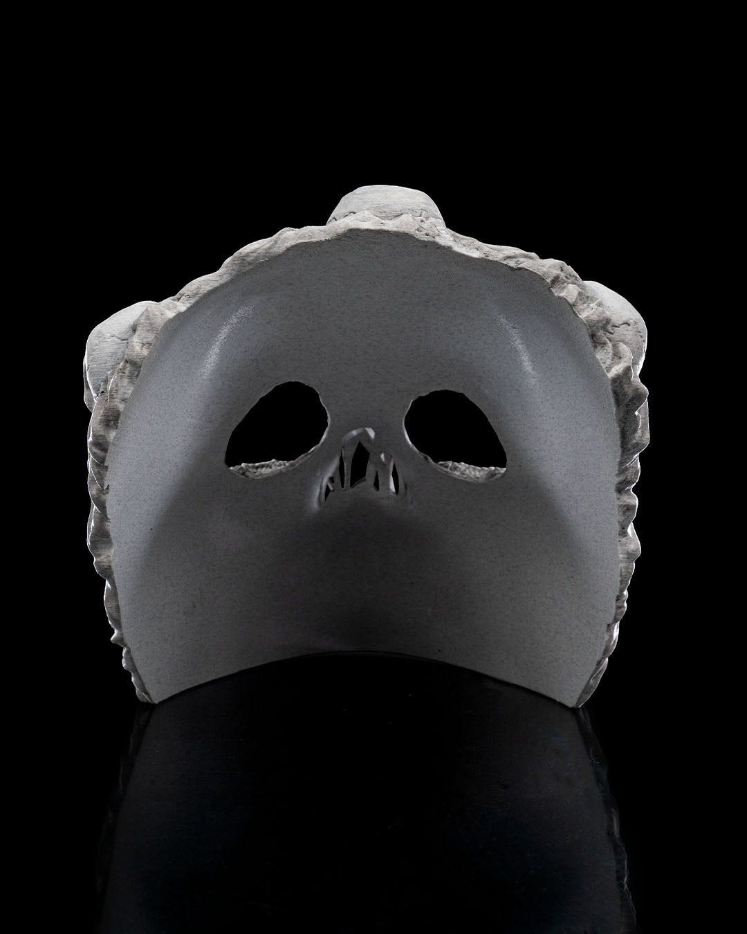 Interior of the Ghoul Face mask showing the curved face opening and eye and nose cutouts.