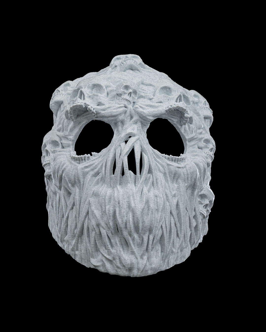 Close front view of light gray Ghoul Face mask showing skulls across the brow and root-like jaw details.