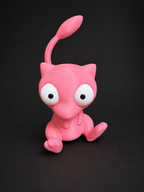 Angled front view of pink Goofy-Eyed Mew sitting with its feet forward and tail raised.