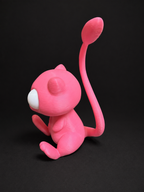 Side view of pink Goofy-Eyed Mew showing its rounded head, seated body, and long raised tail.