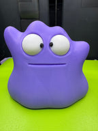 Front view of purple Googly-Eyed Ditto with both black pupils turned inward for a cross-eyed expression.