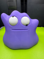 Purple Googly-Eyed Ditto with one pupil facing upward and the other downward, demonstrating its movable eyes.