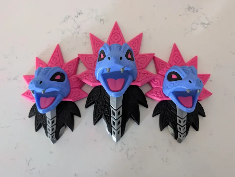 Front view of three-headed Iron Jugulis Pokémon wall art in blue, magenta, black and white with raised filigree.