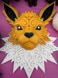 Jolteon Pokémon filigree wall art in yellow, black, and white with detailed ornamental design