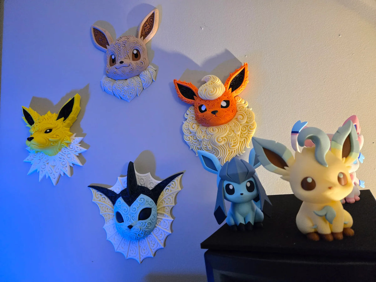 Jolteon Pokémon wall art displayed with other Eeveelution 3D printed wall decor