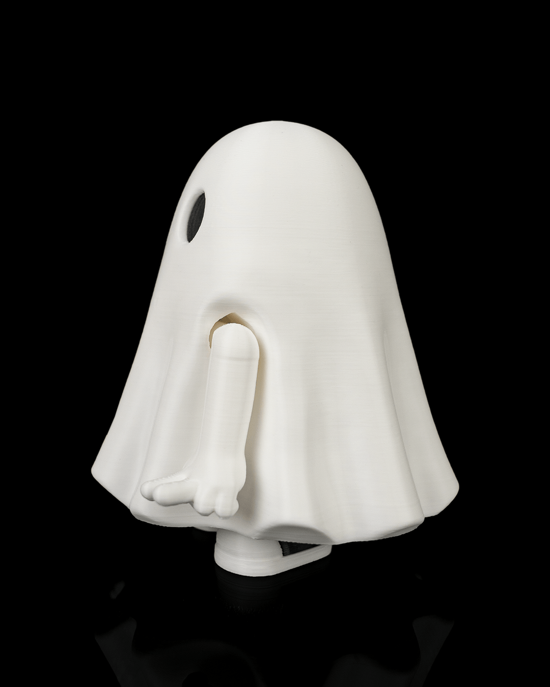 Side view of a white Mood Ghost with its arms lowered, showing the rounded body and sheet-like folds.