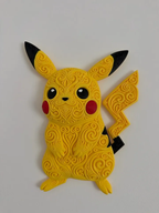 Yellow full-body Pikachu wall art with ornate raised filigree, red cheeks, black ear tips, and a lightning-bolt tail mounted on a light wall.