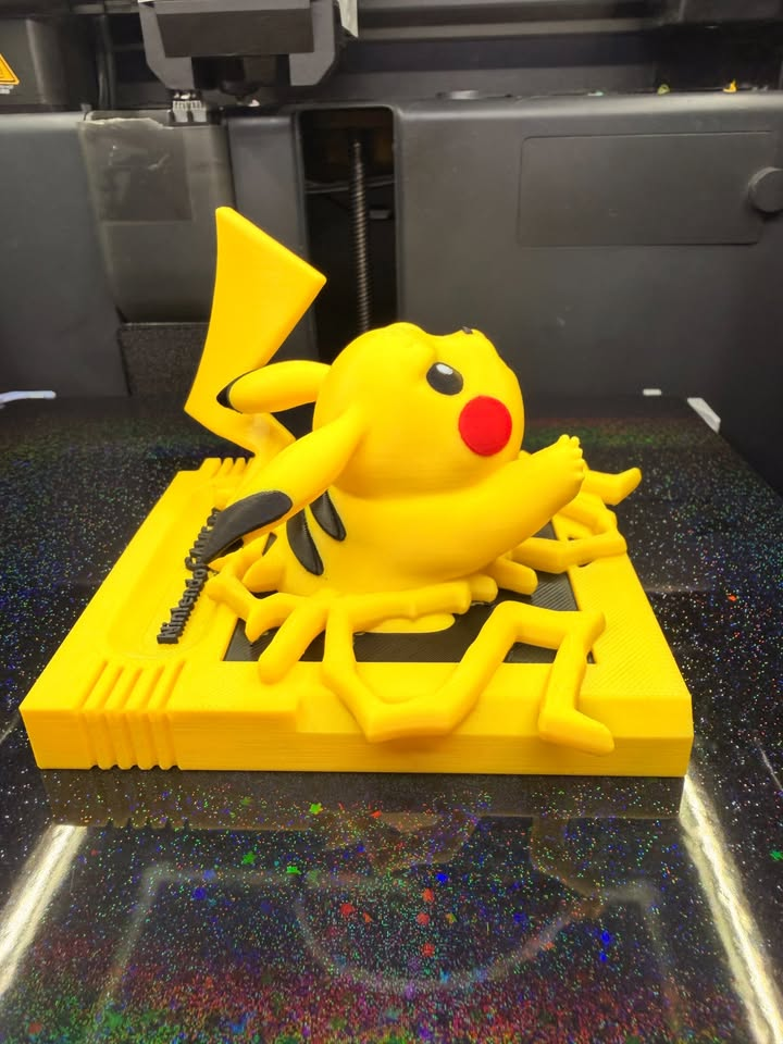 Side view of Pikachu Game Boy wall art showing Pikachu projecting from the cartridge-style base and raised lightning details.