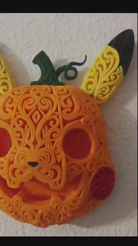 Video of the Halloween Pikachu pumpkin wall art, showing its dimensional filigree design.