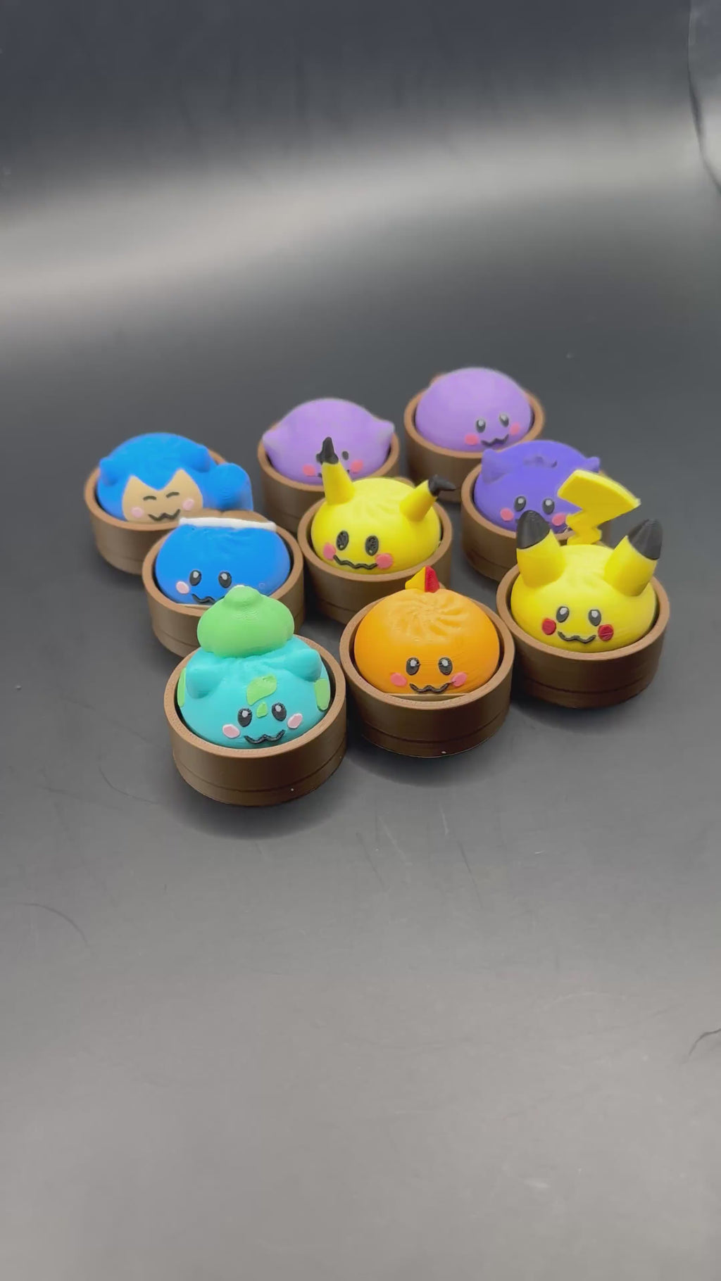 Demonstration of the dumpling clicker designs and clicking action.