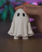 Demonstration of the interactive Mood Ghost desk toy and its moving arms.