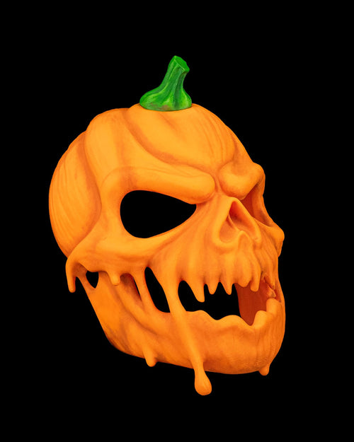 Three-quarter view of the pumpkin Halloween mask showing sculpted orange ridges and pointed teeth.