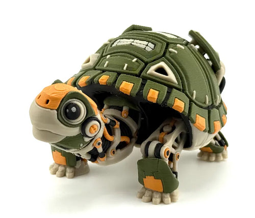 Front three-quarter view of the articulated robotic tortoise with olive green shell, orange accents, beige limbs, and black mechanical details.