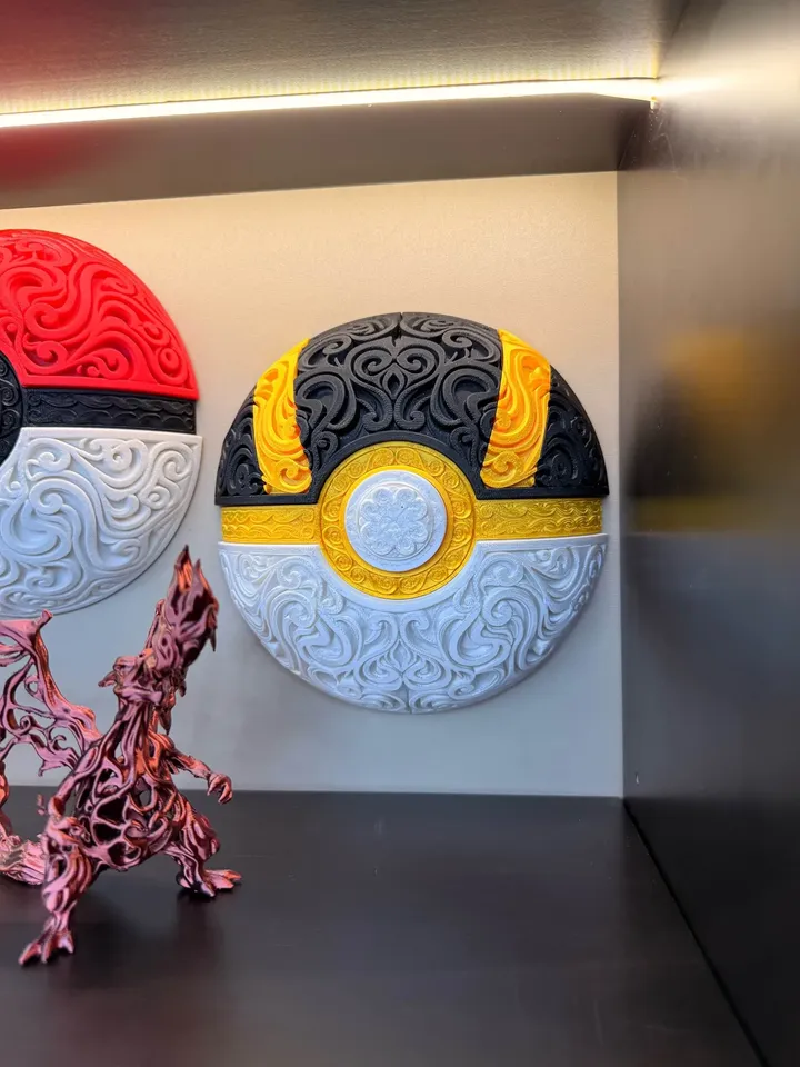 Ultra Ball wall art displayed in a lit cabinet beside other Pokémon decorations.